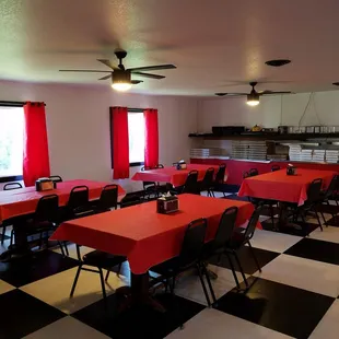 a dining room with a checkered floor