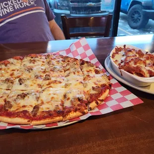 Large sausage &amp; mushroom pizza Baked meatball pasta.