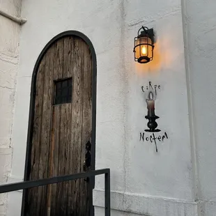 Outside entrance to speakeasy. It&apos;s to the left on the patio of coco shrimp