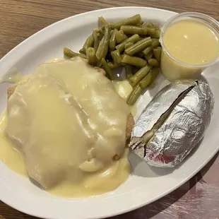 Chicken fried steak, baked potato