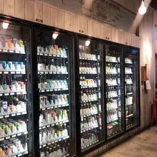 a row of refrigerators in a store