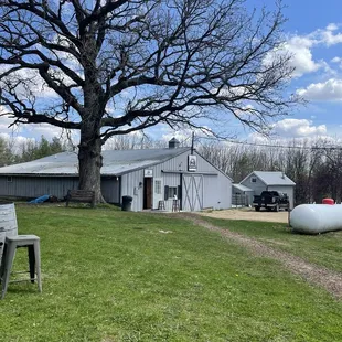 a barn and a picnic table