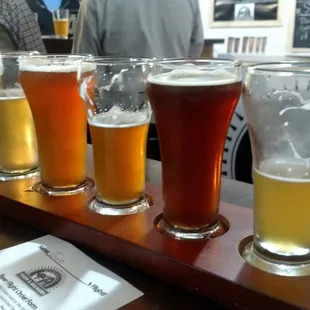 Flight of apple honey, lemon drop, unicorn, Belgium, jack-java, apple ale.