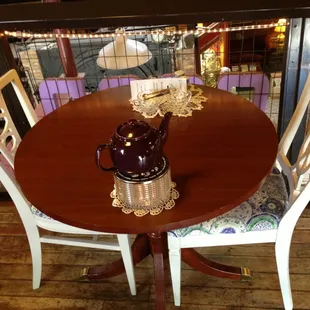 One of the tables overlooking the first floor of Pottery Place. Very homey decor, like going to grandma's.