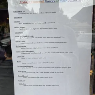 a menu in a restaurant window