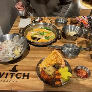 Topokki, broth, side dishes