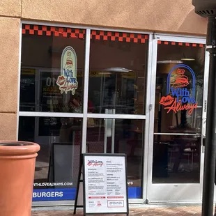 10:56 a.m., 4 minutes to opening, about a dozen people in line.