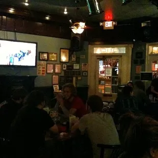 a group of people sitting at a table