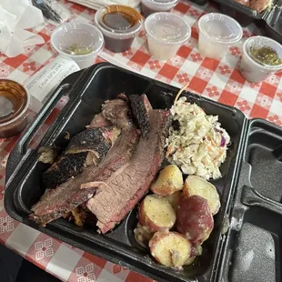 Brisket with pulled pork, cole slaw and Red potatoes