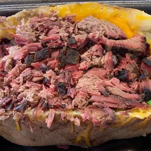 Loaded baked potato with chopped brisket