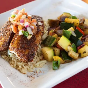 Blackened Tilapia served with Roasted Veggies and Cilantro Lime Rice