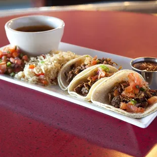 Choose from Braised Pork, Brisket, Spicy Beef and Grilled Chicken tacos.