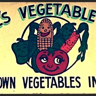 a sign for a vegetable farm