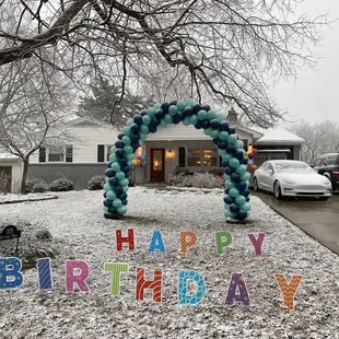 Balloon arch from Witty's Party Supply.