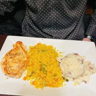 Grilled chicken with mashed potatoes and rice