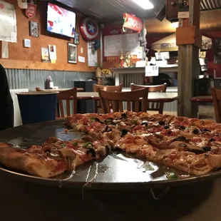 Hurry up and eat so you can get the last slice!!! Delicious pizza!!!