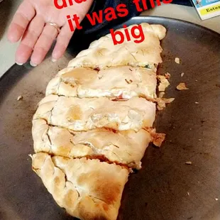 Calzone mama had pepperoni cheese and spinach