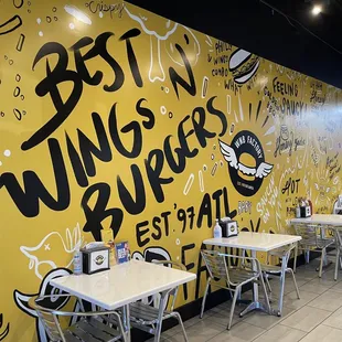 Clean and nice mural, hand sanitizer at every table