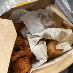 Twelve piece wings (half lemon pepper/half honey hot) with fries.