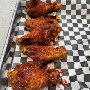 chicken wings on a checkered tray