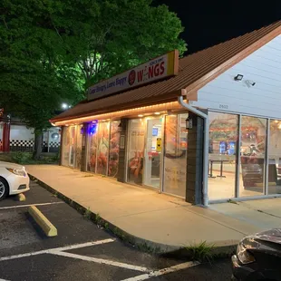 a car parked in front of the store