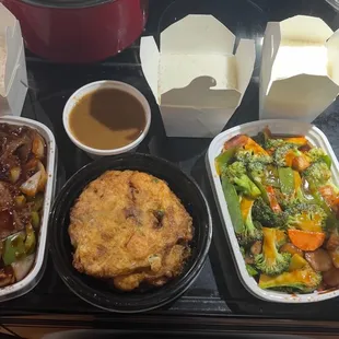 Vegetable delight, pepper steak and onions, shrimp egg foo young with gravy, and shrimp fried rice
