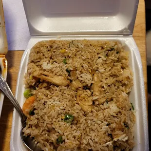 House fried rice with chicken, beef and shrimp.