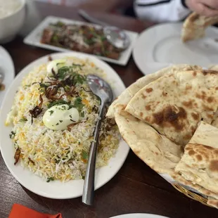 Naan, Chicken Biryani, sesame beef