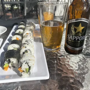 Avocado, Cucumber Veggie Roll with a Sapporo Beer