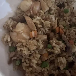 Egg fried rice (house) it's mixed with steak, chicken and shrimp. They were out of pork