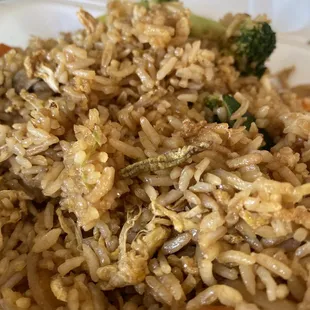 a plate of rice and vegetables