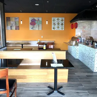 A Portion of the Dining Area with counter and Sushi Bar