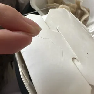 Hair in food.