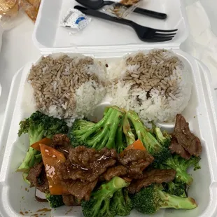 a meal in a styrofoam container