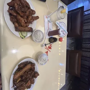 orange chicken and sesame chicken with white rice