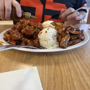 SC10. Teriyaki Chicken and General Tso&apos;s Chicken Combo (off the lunch menu) with the teriyaki spicy.