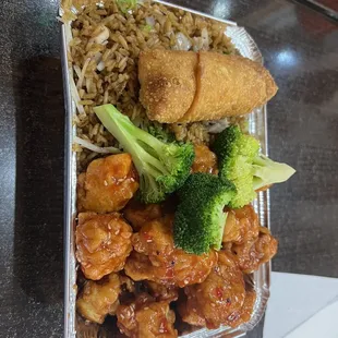 Sesame Chicken Combo Platter - menu says spicy but when I asked she said they could do low heat and it came out not spicy at all