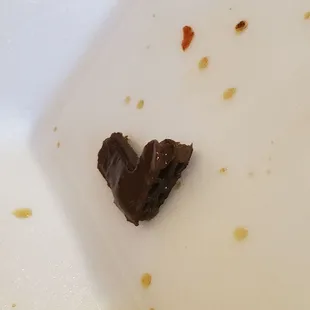 a piece of chocolate on a plate