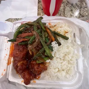 Orange chicken, spicy beef, and white rice. It is really good and I'd recommend to try. It's worth it's value.