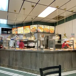 a woman standing at the counter