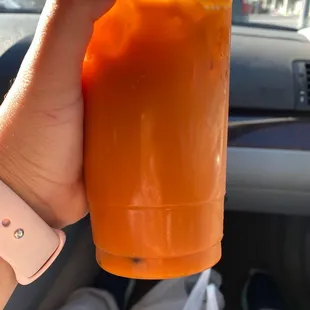 Milk Thai Tea, just dropped in here to get me some Chinese and got this Thai tea. The boba is super hard.