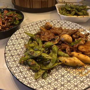 Beef with snow peas and mushrooms. Garlic edamame.  Very fresh and lots of it!