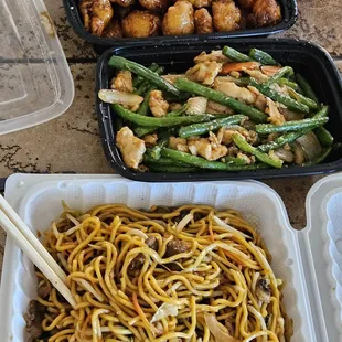 General tso's chicken, chicken sauteed green beans and beef lo mein.  Delicious