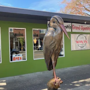 Right behind the Pelican statue!