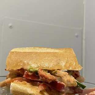 a sandwich on a glass plate