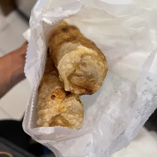 Huge Fried Egg Rolls (vegan when ordered with veggies. Skip the fish sauce). Very flavorful!