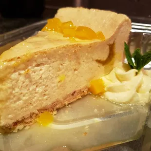 Mango cheesecake w/pecan crust &amp; lemon custard ($8), vegan by default. Little flavor, rubbery texture.