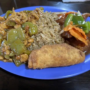 a plate of food with rice and vegetables
