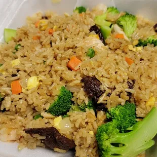 rice and vegetables in a styrofoam container
