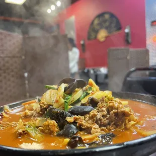  bowl of stew with meat and vegetables